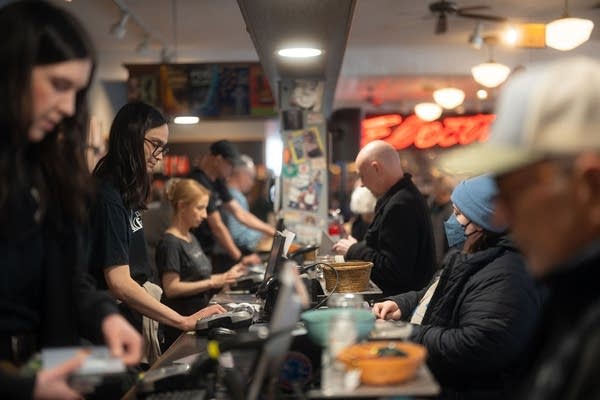 Customers make purchases at Electric Fetus in Minneapolis on Record Store Day, Saturday, April 18, 2026.