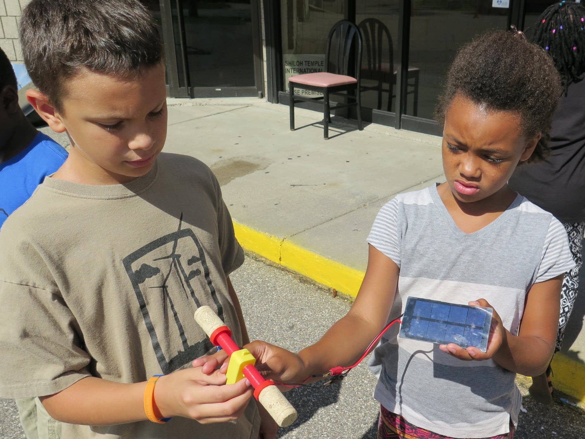 Roman Konewko and Semira Kretz test a motor.