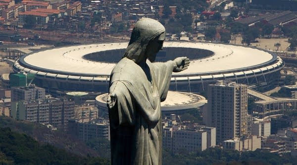 An aerial view of the Christ The Redeemer statue (F) and the Maracana Stadium (B) on November 12, 2013 in Rio de Janeiro, Brazil.