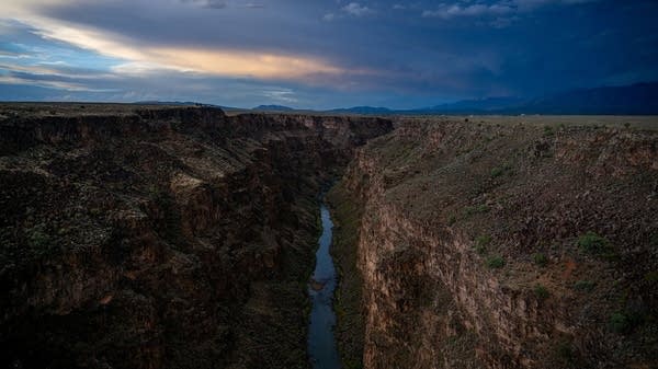 Above, a view of the Rio Grande River in Taos County, New Mexico. Mexico must send water from the Rio Grande to Texas, but has been in default for much of the 21st century. 
