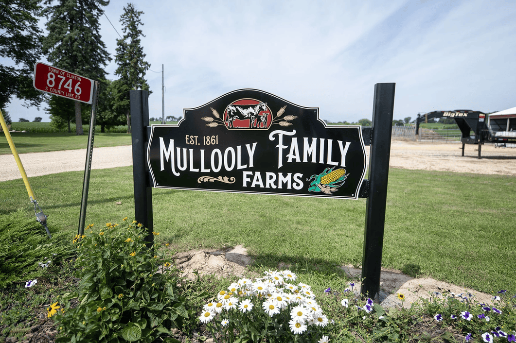 A sign for a farm