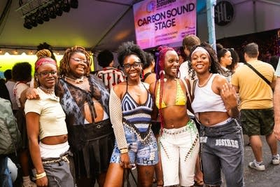 people enjoying an event with live music