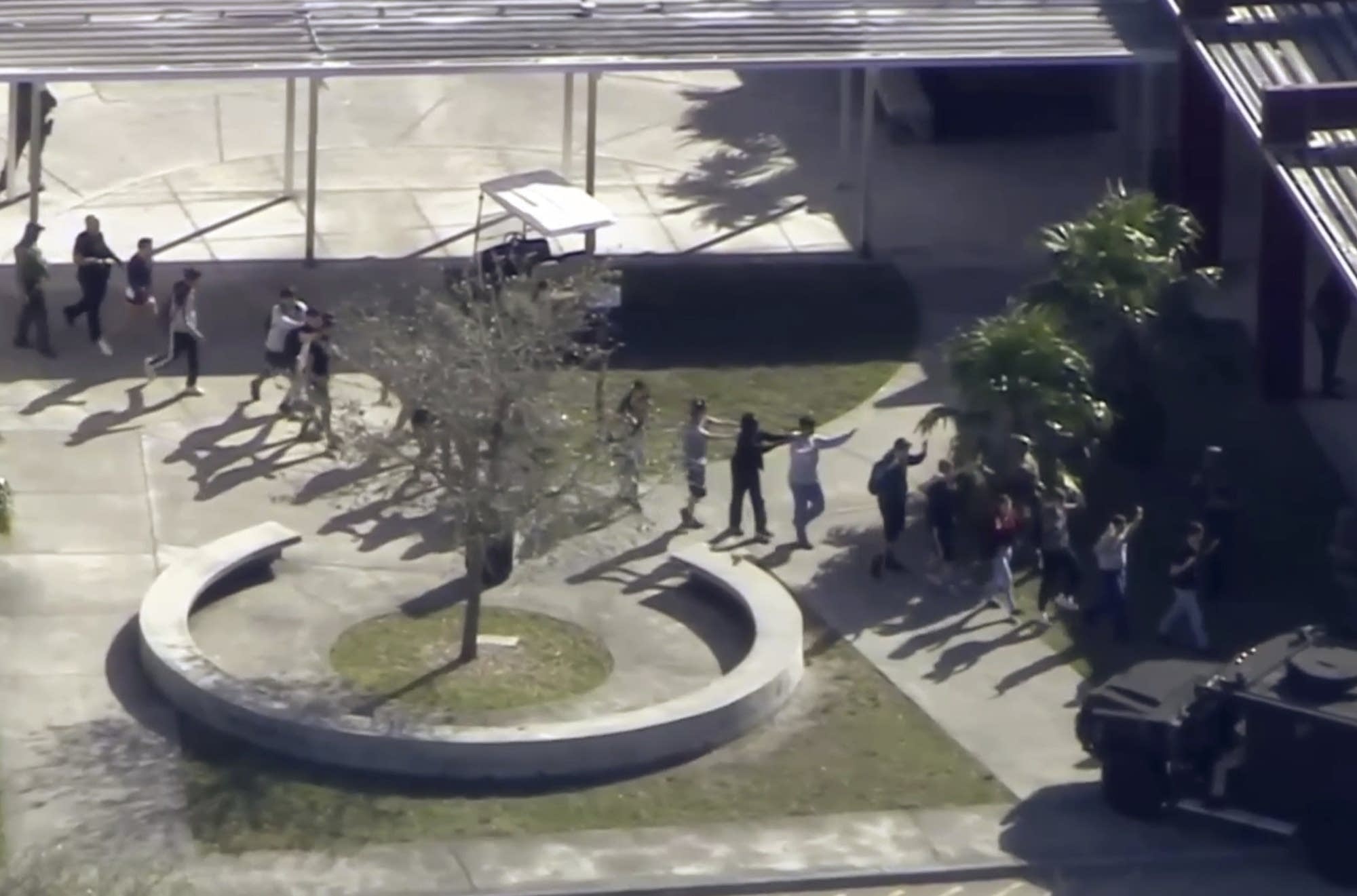 Students from the Marjory Stoneman Douglas High School evacuate.