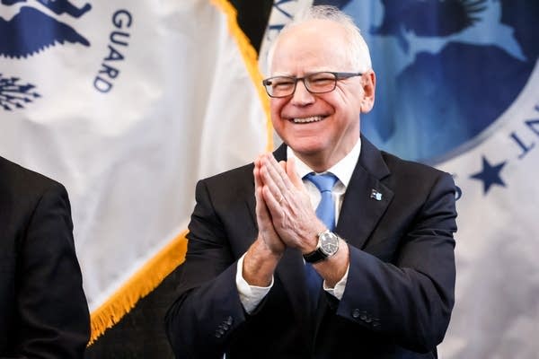Gov Walz clapping hands