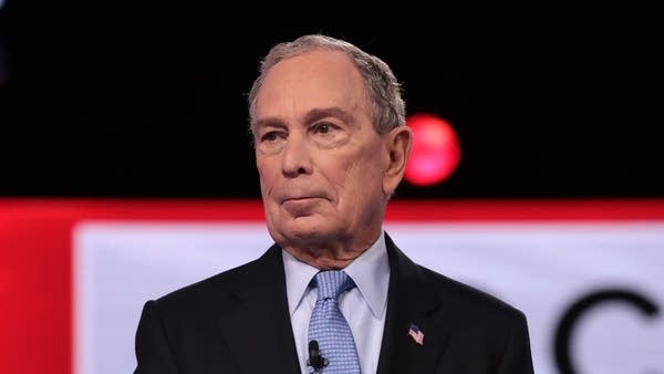Democratic presidential candidate Mike Bloomberg arrives on stage for the Democratic presidential primary debate at the Charleston Gaillard Center on Feb. 25 in South Carolina.