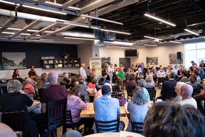 A large gathering at a brewery.