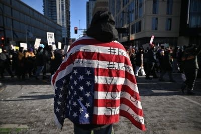 protestor with flag