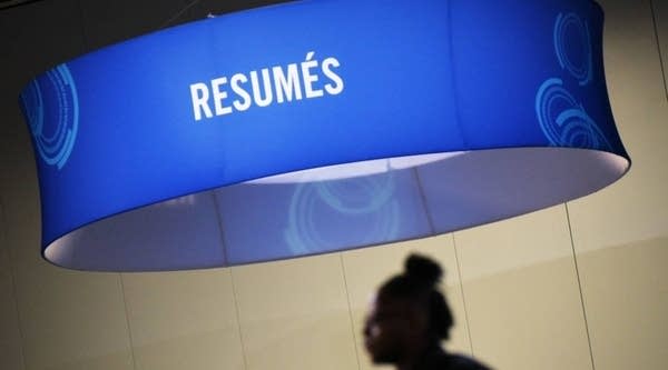 Job seekers arrive at the Walter E. Washington Convention Center for The Opportunity Hiring Fair in Washington, DC, on September 20, 2017.