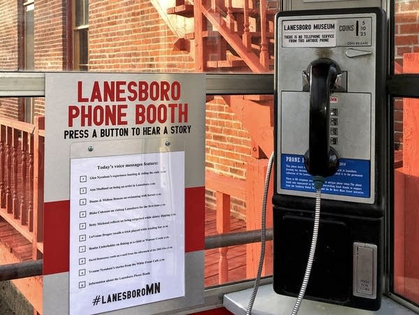 A phone booth outside the museum lets people listen to oral history.