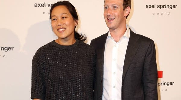 Priscilla Chan and Mark Zuckerberg arrive for the presentation of the first Axel Springer award.