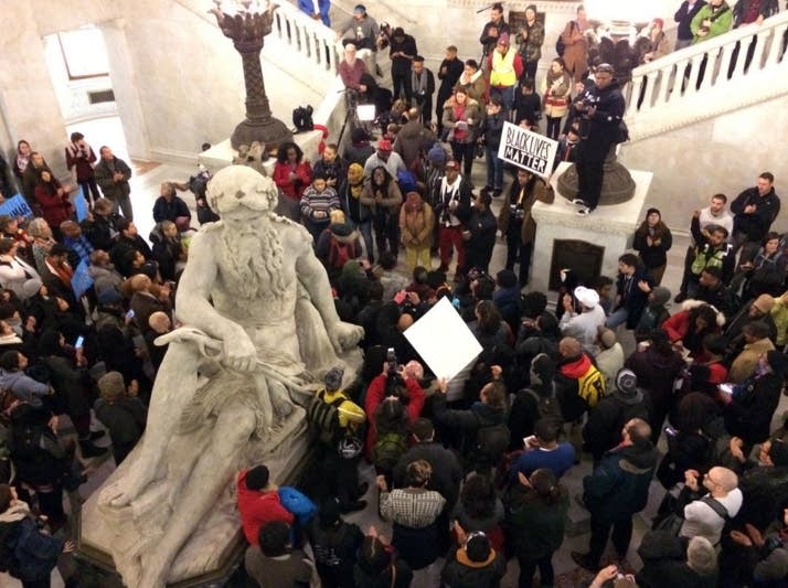 Supporters gather at City Hall.