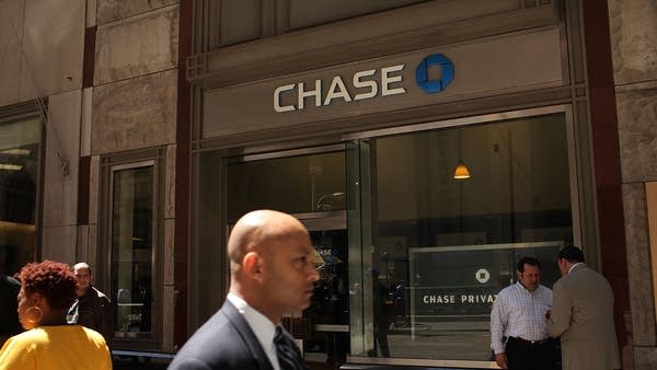 The potential to earn in a savings account has gone down with interest rate cuts. Above, a Chase Bank in New York.
