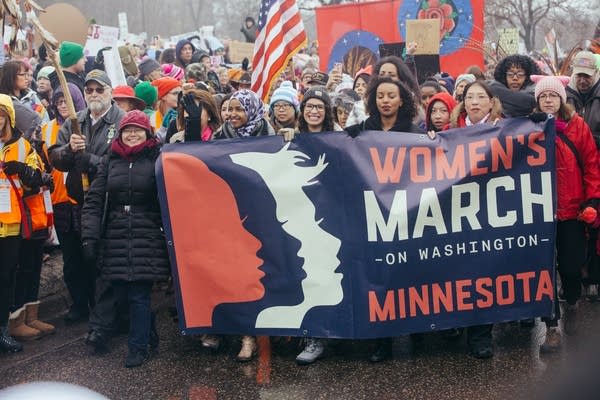 Ilhan Omar and other women lead the march.