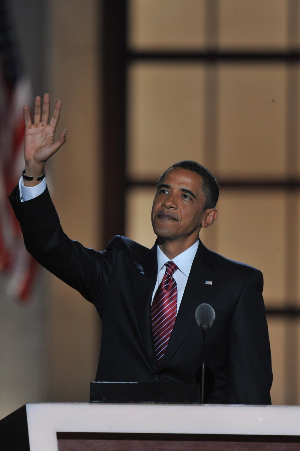 Barack Obama greets the crowd at Invesco Field