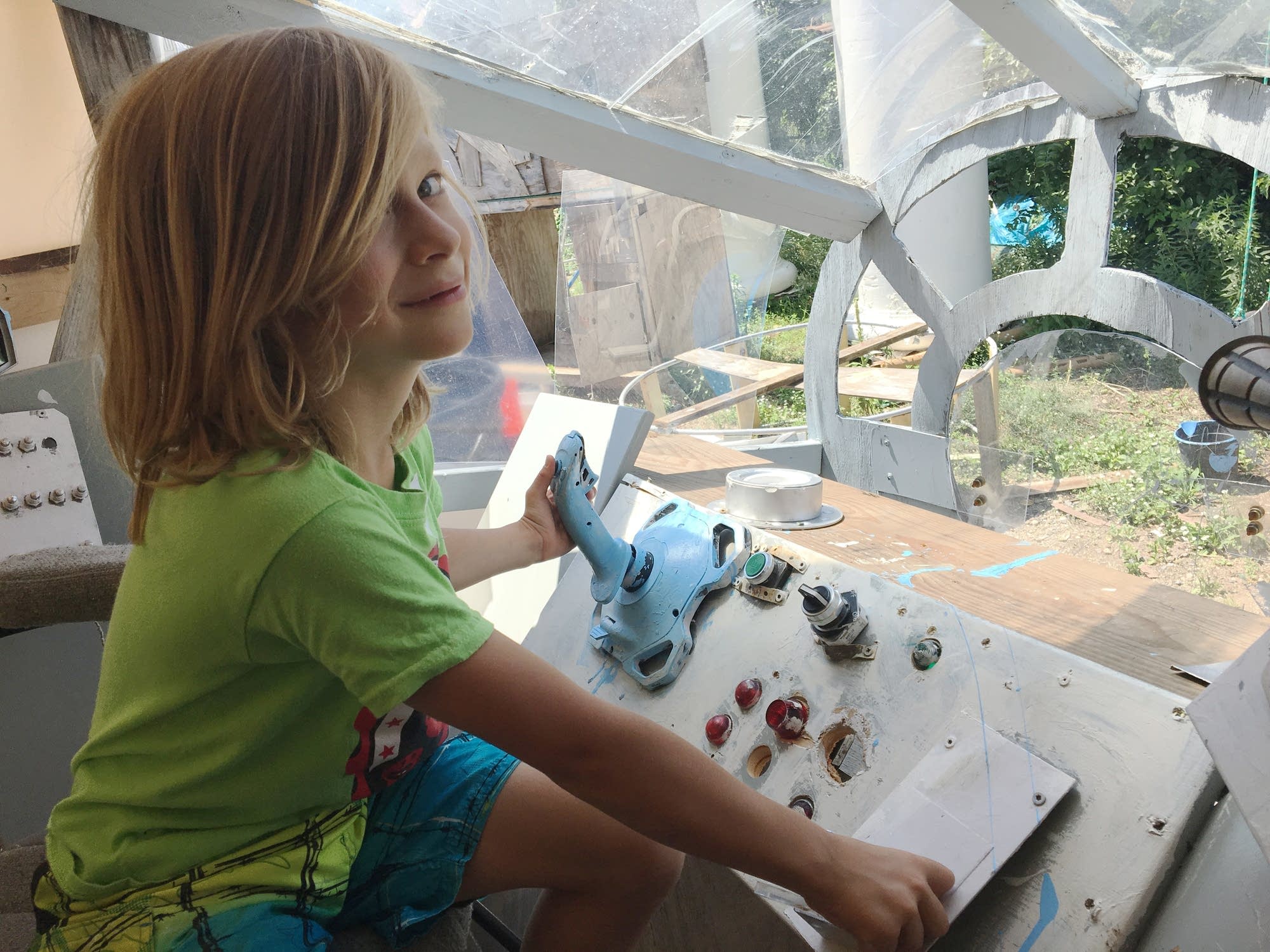 Tove Wing is poised to activate the Millennium Falcon's self-destruct.
