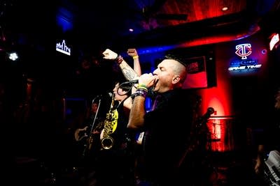 A rock band performing onstage