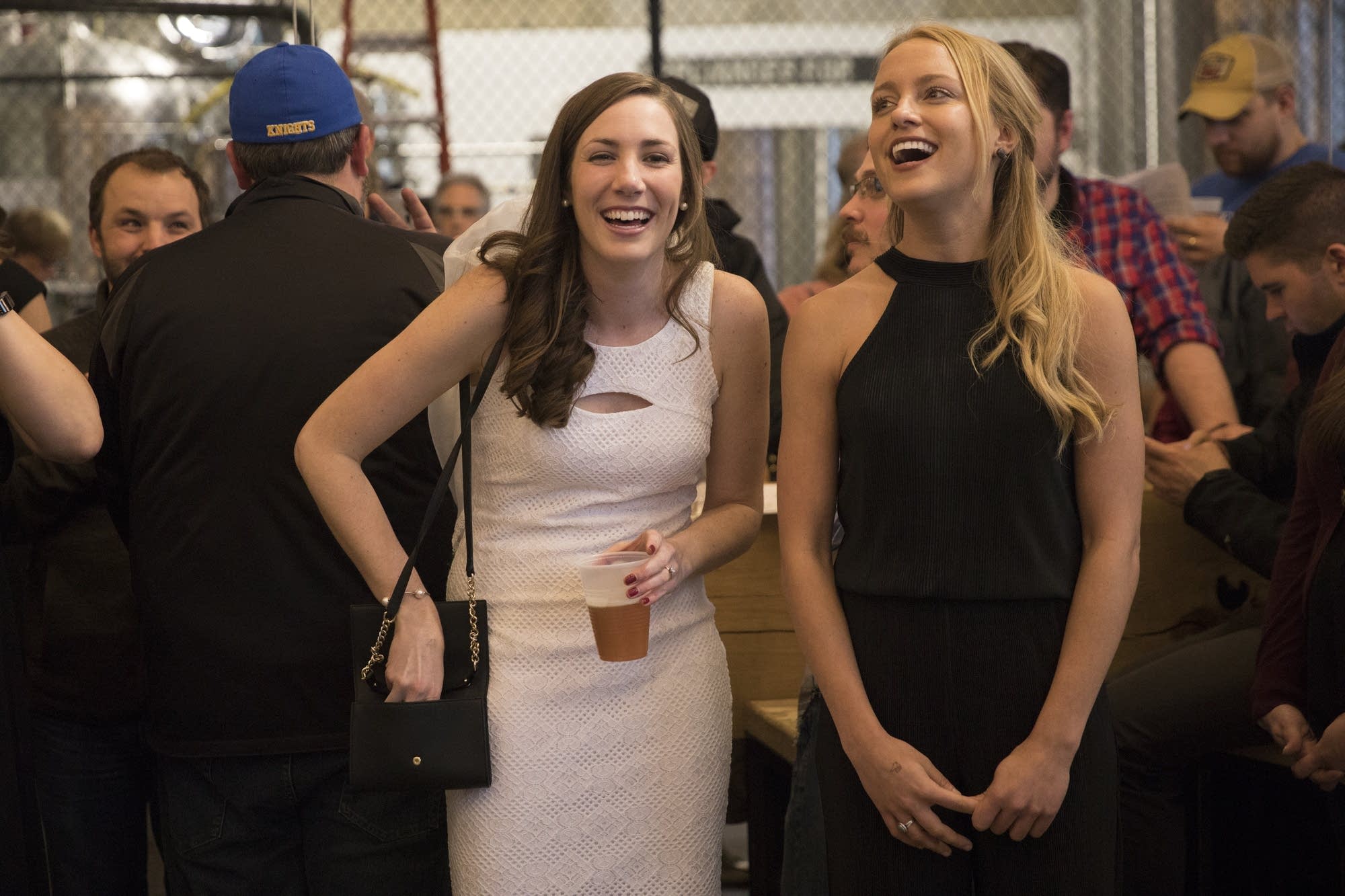 Kristin Donner, in white, enjoys a song in her honor.