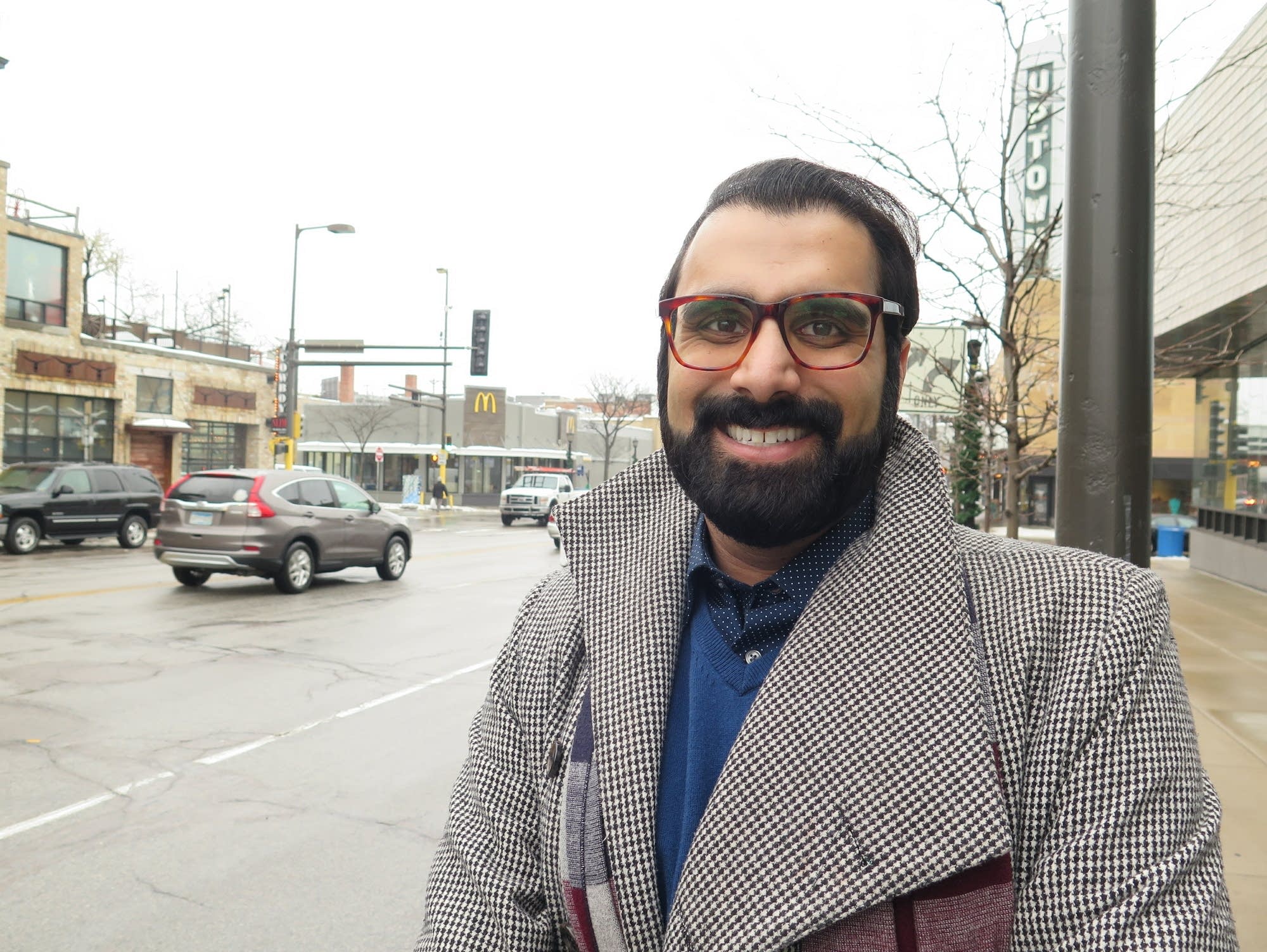 Rushabh Bhakta poses for a portrait outside Walker Library in Minneapolis