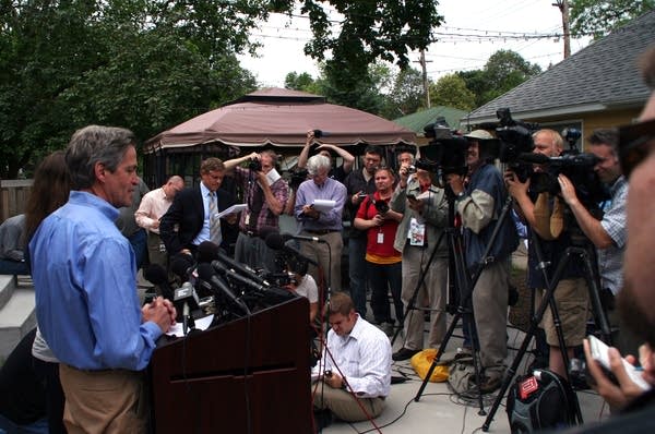 Norm Coleman addresses media at his home