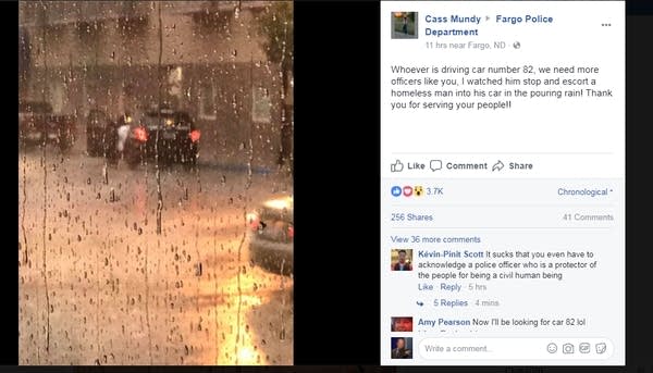 In pouring rain, Fargo cop stops to help homeless man