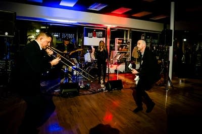 A band performing onstage