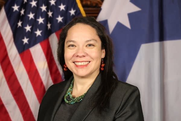 A woman poses for a professional headshot.