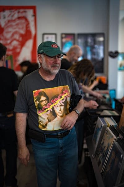 Person wearing The Current hat