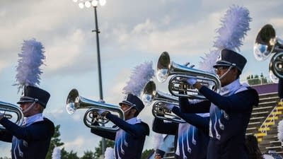 Hear the horns of River City Rhythm drum and bugle corps