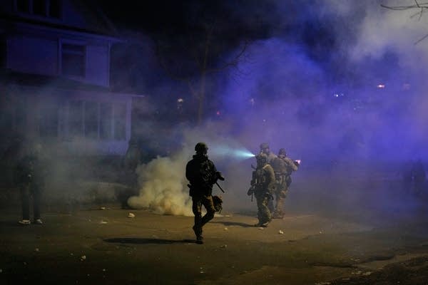 Two men accused of assaulting ICE officer will stay in pre-trial custody despite judge's order