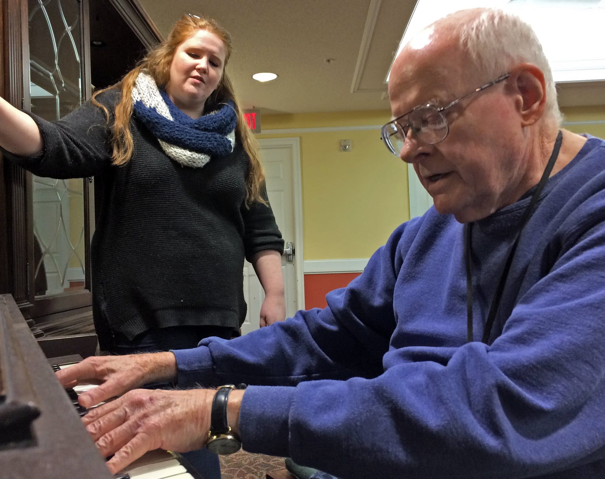 Jim O'Brien and Caitlin Heaney sing together.