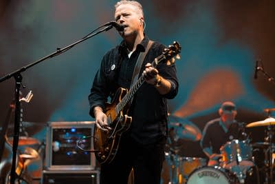 Jason Isbell and the 400 unit performing on stage