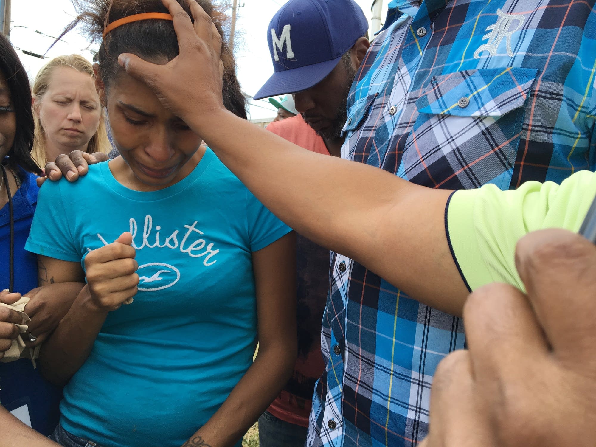 Rev. Jerry McAfee prayed for the mother.