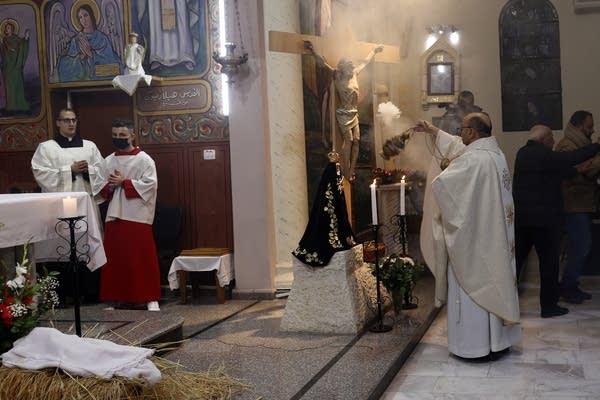Israeli strike hits Gaza church, killing 3 and wounding priest who was close to Pope Francis 