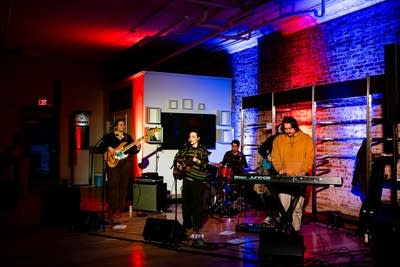 A band performing onstage