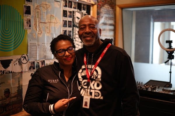 sanni brown and derrick stevens posing for a photo