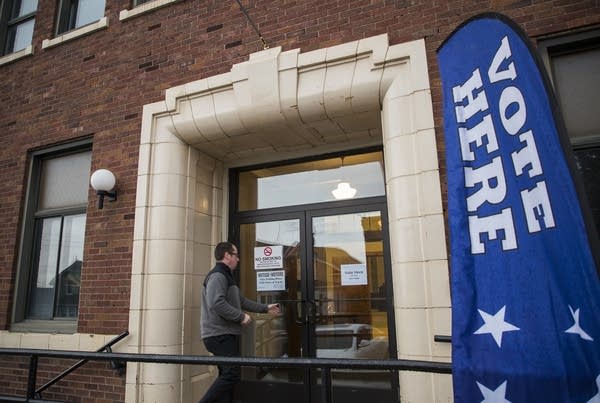 A voter walks into the Eveleth City Auditorium Tuesday.