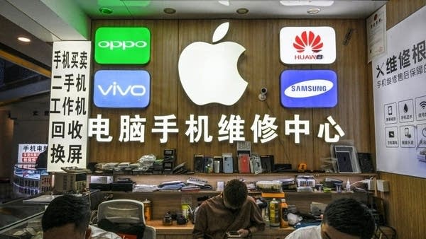 An electronics store in a Shenzhen tech market, where vendors are selling some restricted NVIDIA superchips.