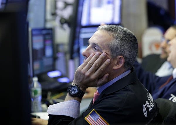 Stocks slide as oil tumbles, S&P lowest in almost 2 years
