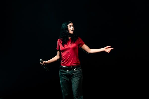 Lorde performing on stage