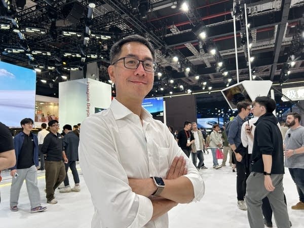 Auto journalist Ju-Len Leow from Singapore's Business Times poses at the 2025 Shanghai auto show