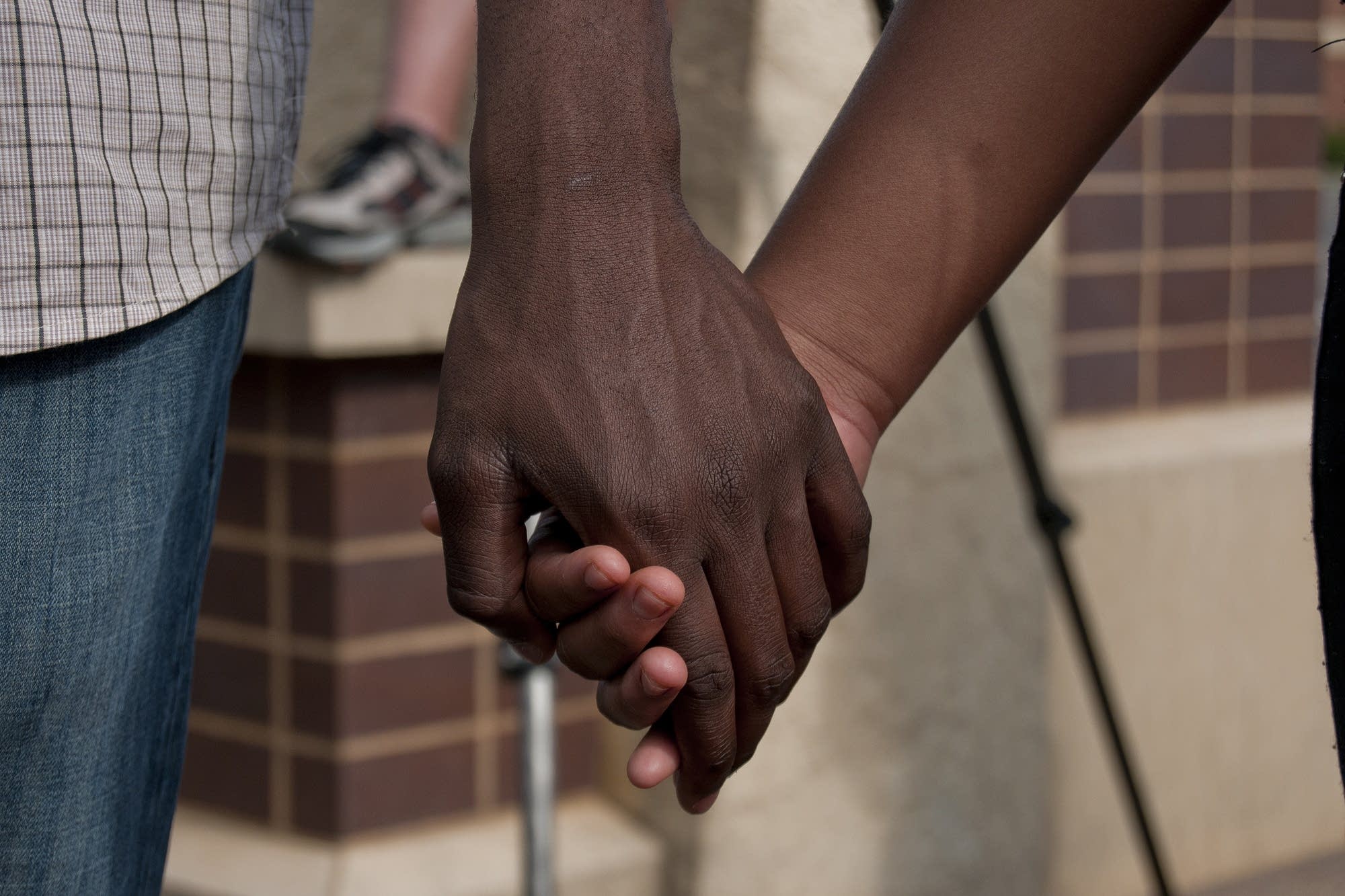 Holding hands during a prayer circle.