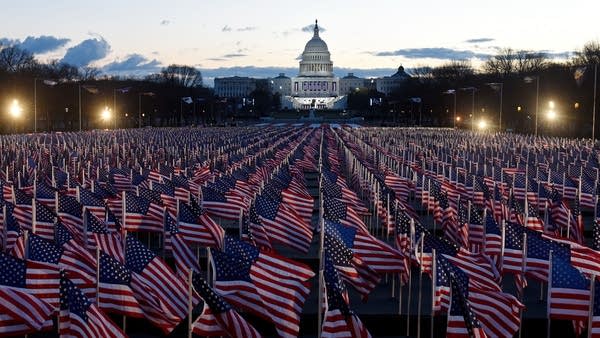 American flags decorate the "Field of Flags" at the National Mall near the U.S. Capitol early morning ahead of the inauguration of U.S. President-elect Joe Biden on Jan. 20, 2021 in Washington.