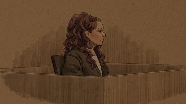 A courtroom sketch of a woman on the witness stand.