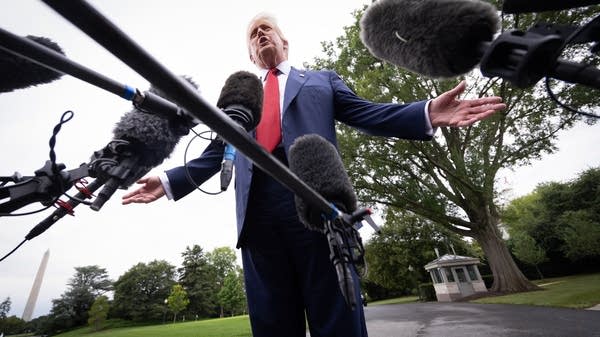 President Trump speaks to media on the White House lawn