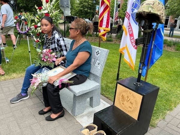 Woman and granddaugther on bench