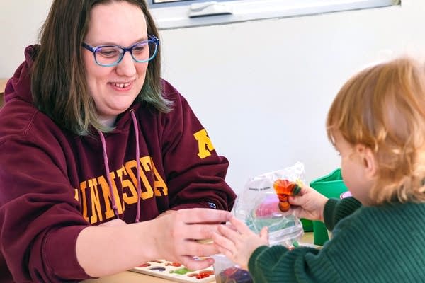 Mom playng with her daughter