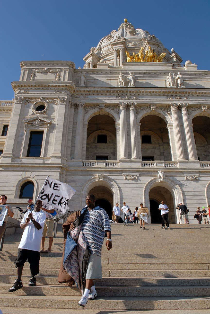 A human rights group protests at the State Capitol