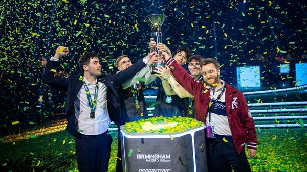 French team Karmine Corp lift the trophy at the BLAST Rocket League tournament in Birmingham, England.