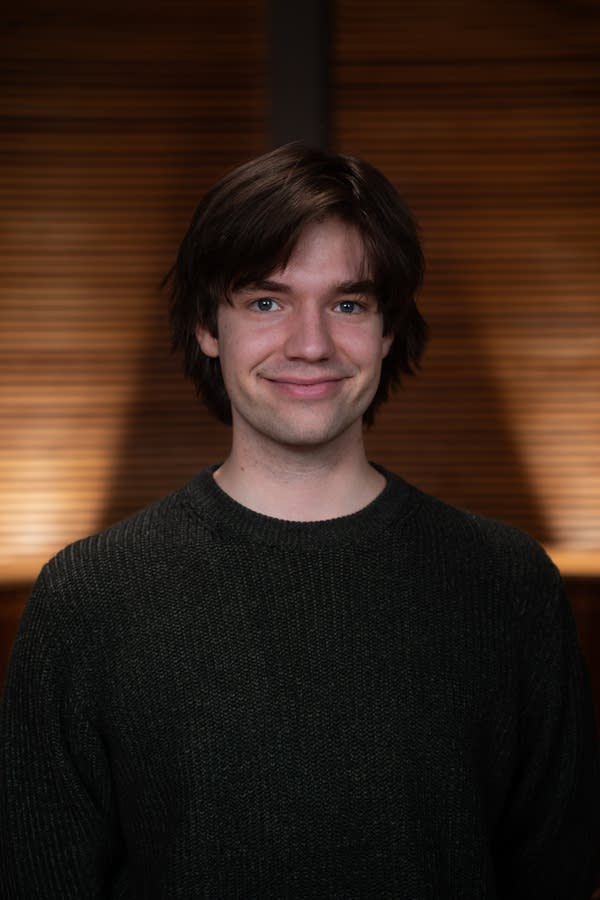 a man smiles