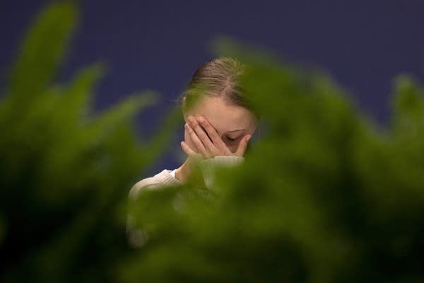 Swedish environmental activist Greta Thunberg gestures during a conference with scientists at the COP25 Climate Conference in Madrid in 2019.